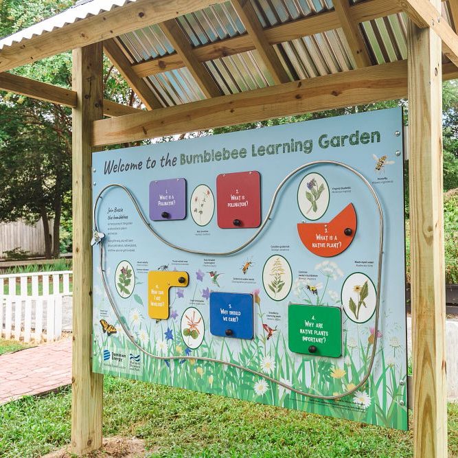 Interactive educational outdoor sign in the bumblebee learning garden.