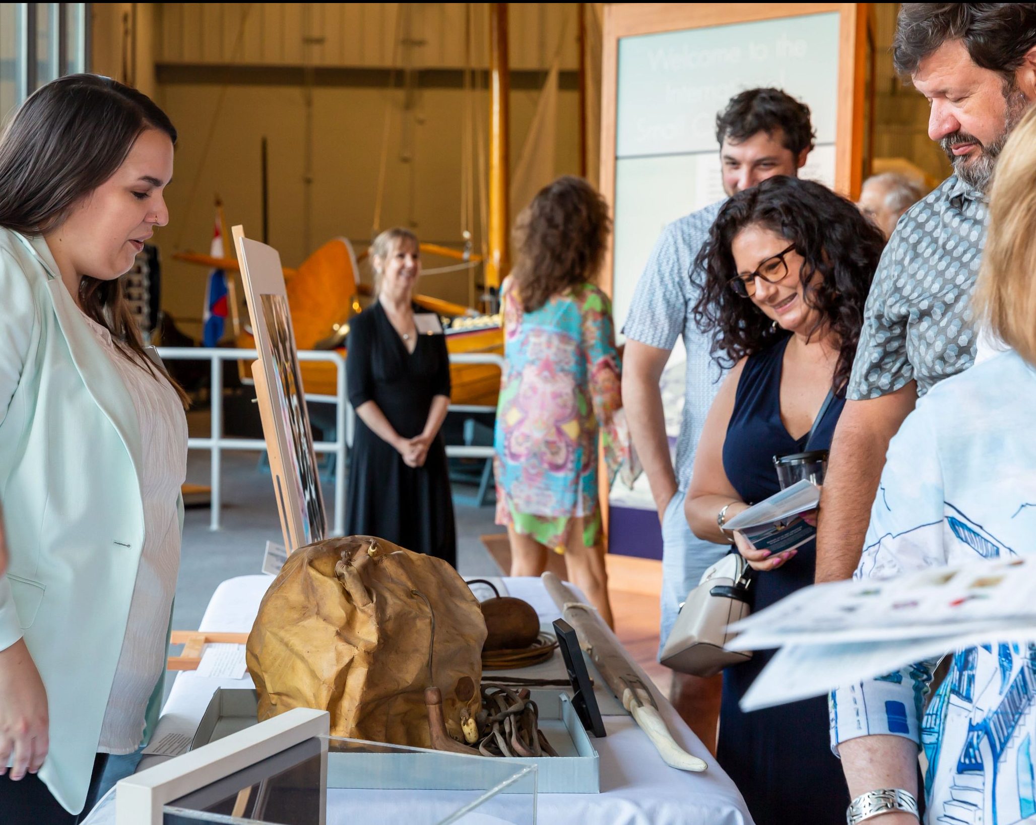 Guests browse artifacts out on special display at The Mariners' annual Sips & Trips event. 