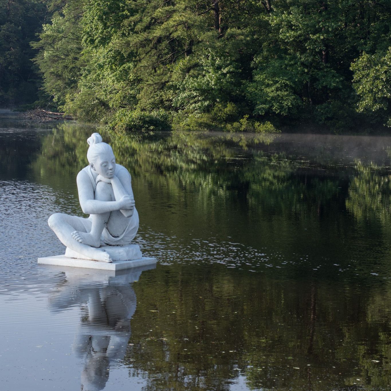 Newport News Arts Commission statue, Selene, by Italian sculptor María Gamundí in Kettle Pond.