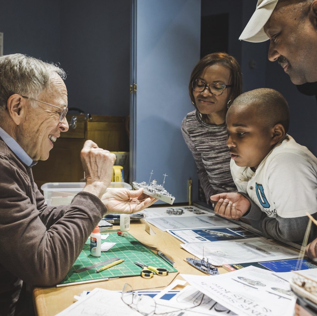 Family engaging with Ship Model Maker.