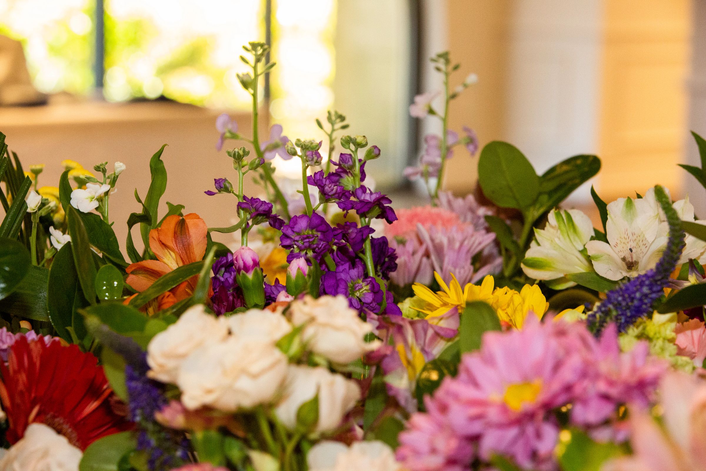 Vase of flowers on a table.