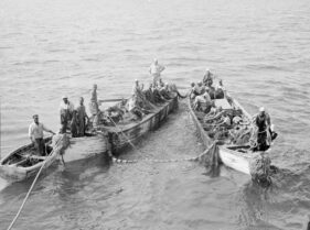 2 boats with fisherman