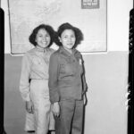 Left to right: Sisters serving in the Women's Army Corps, Pvt. Lupe Mirabel and Pvt. Florence Lee, photographed by the US Army Signal Corps.