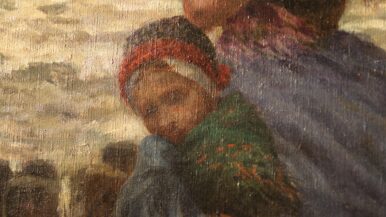 Detail of the child nestled against the woman beside her.