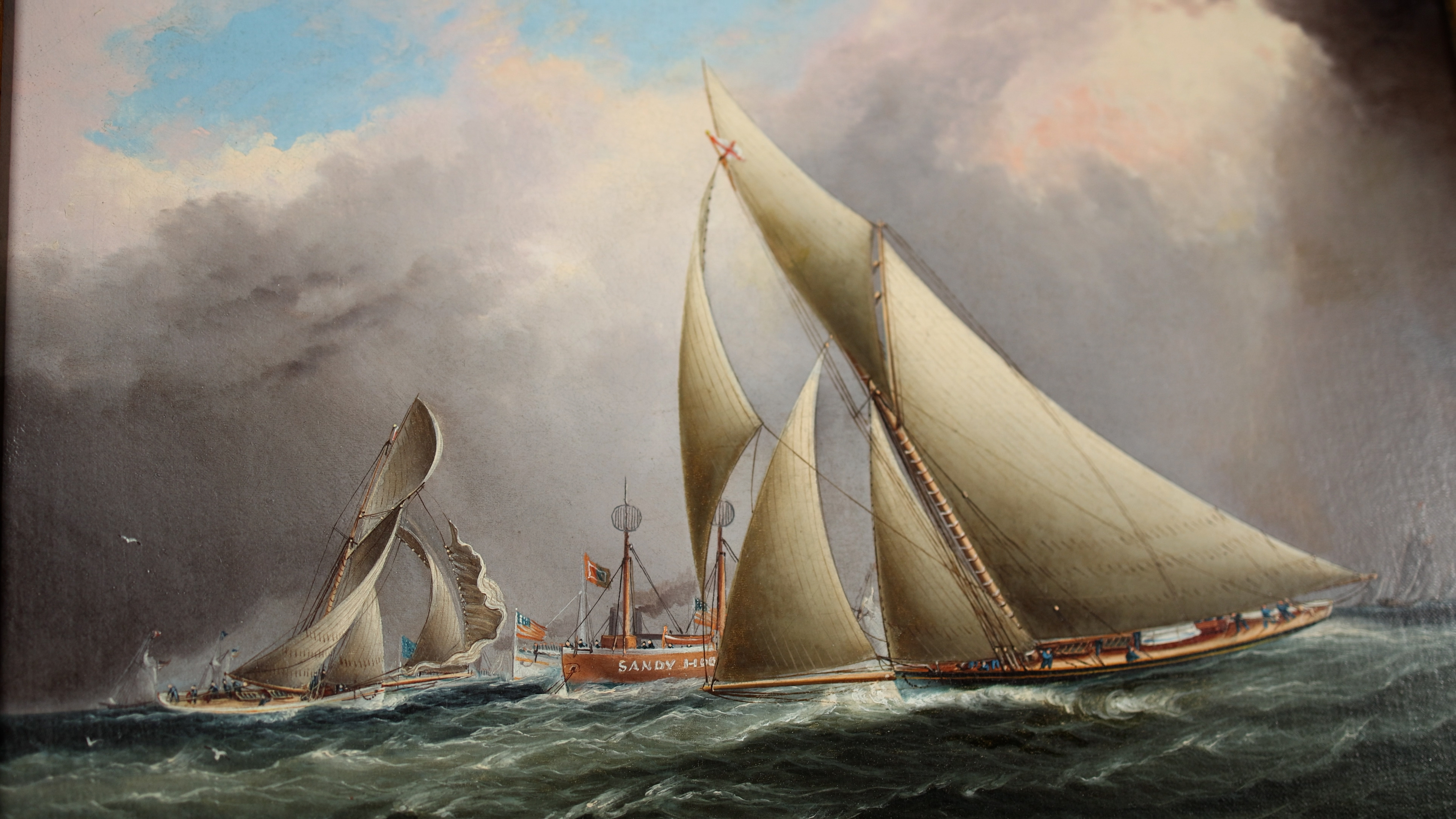 Mayflower leads Galatea around the Sandy Hook lightship.