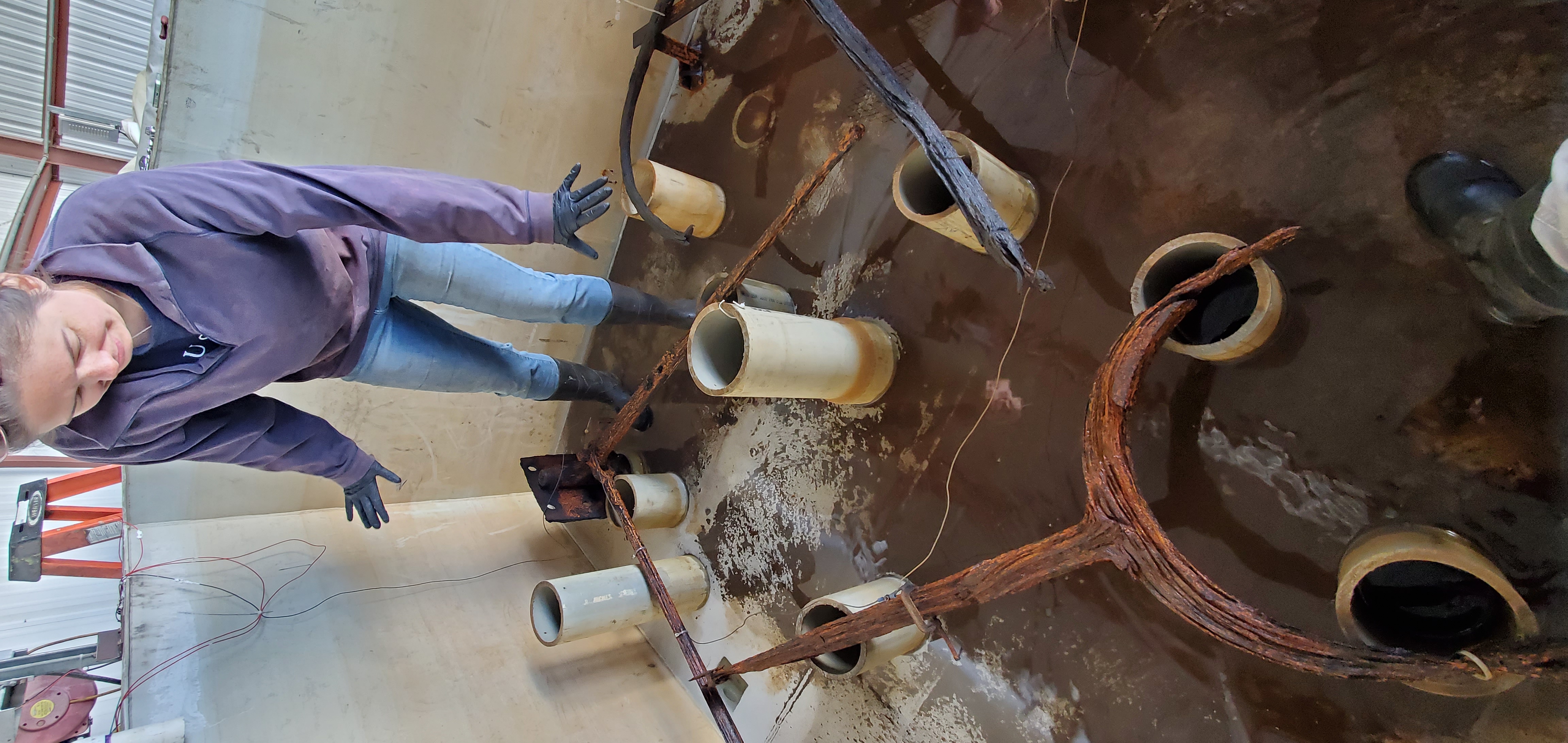 Archaeological Conservator Lesley Haines getting ready to re-position one of Monitor’s objects.