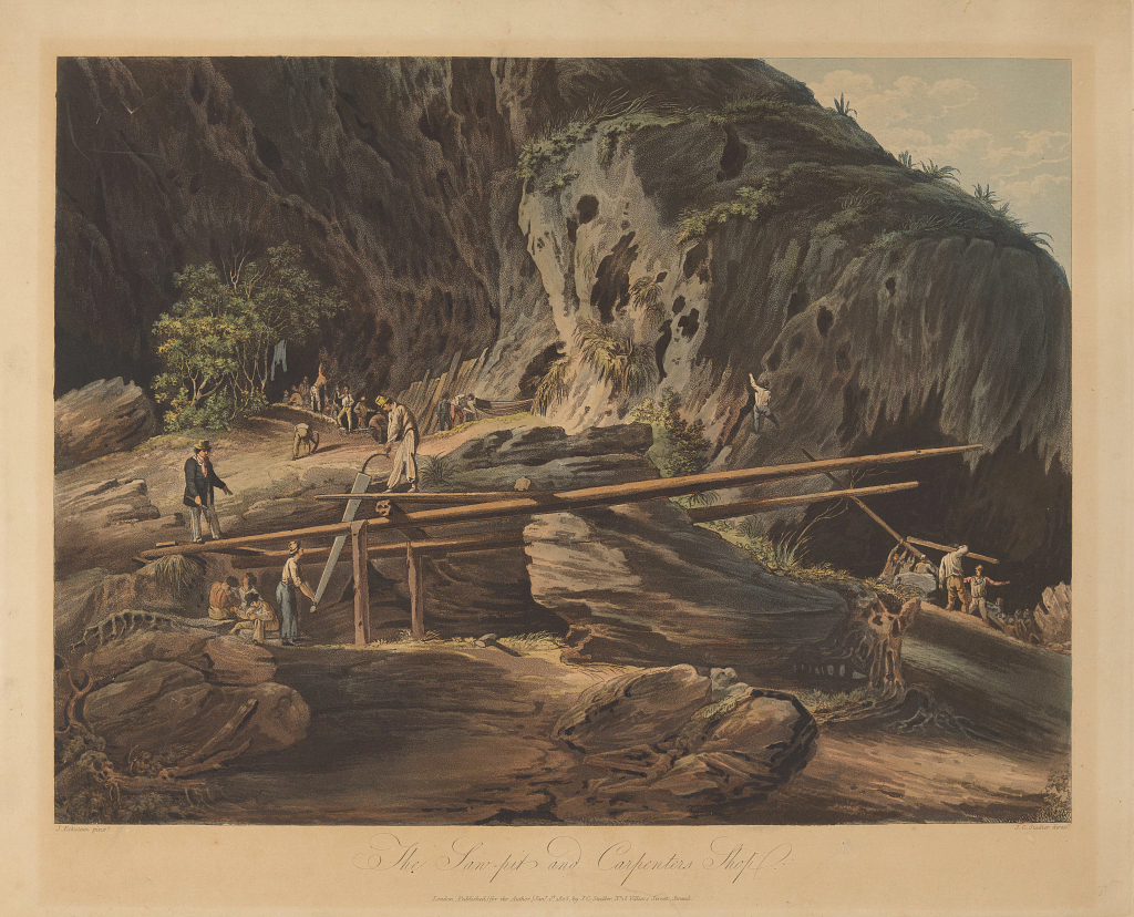 The Saw Pit and Carpenter’s Shop. If you look very carefully at the group of three people sitting under the man directing the work, you’ll notice something interesting – one of them is a woman!