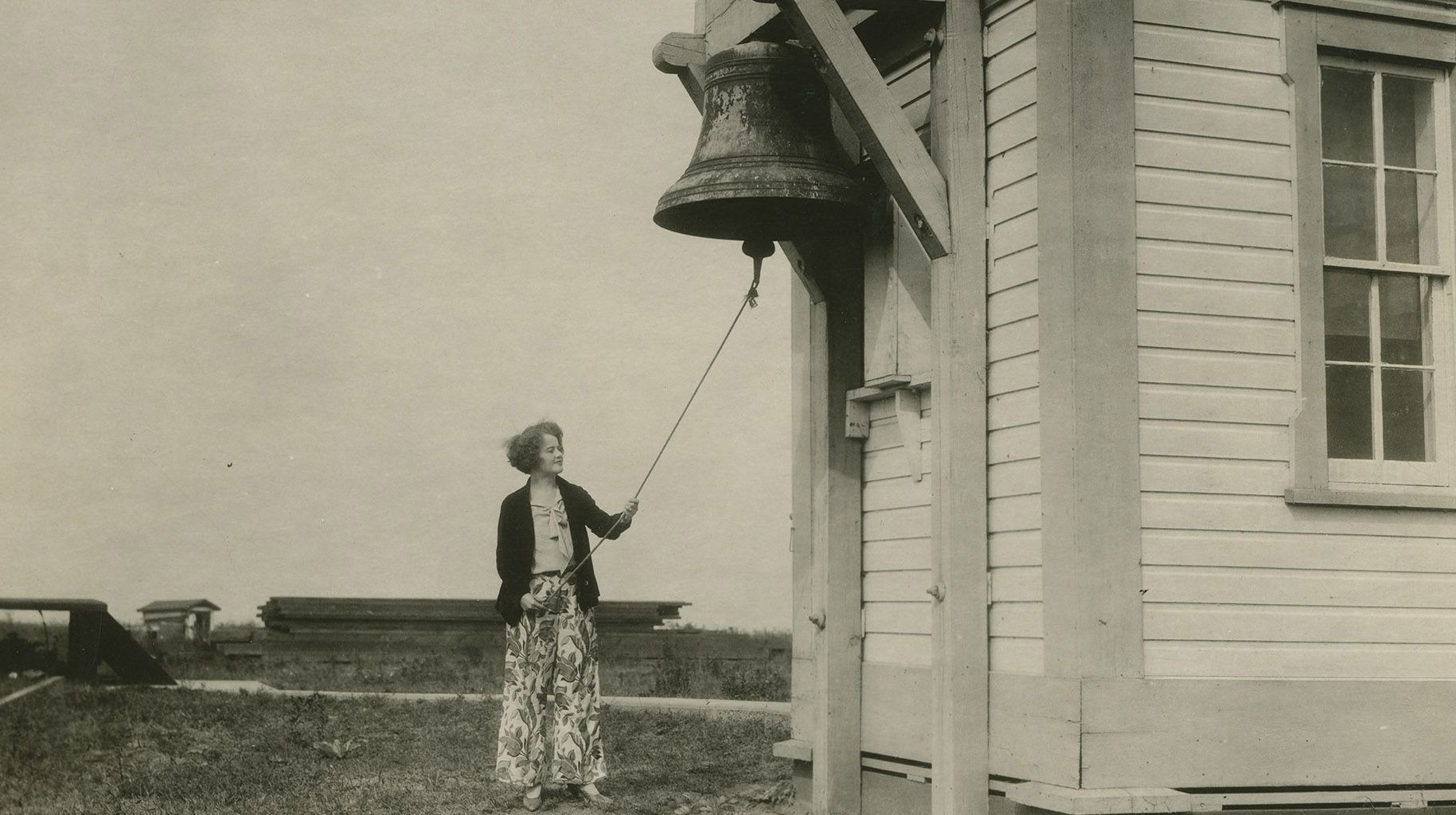women ringing a bell
