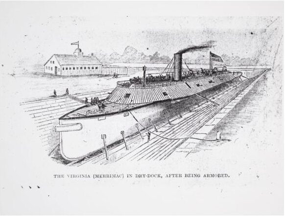 A ship sits in a dry dock with people on board.