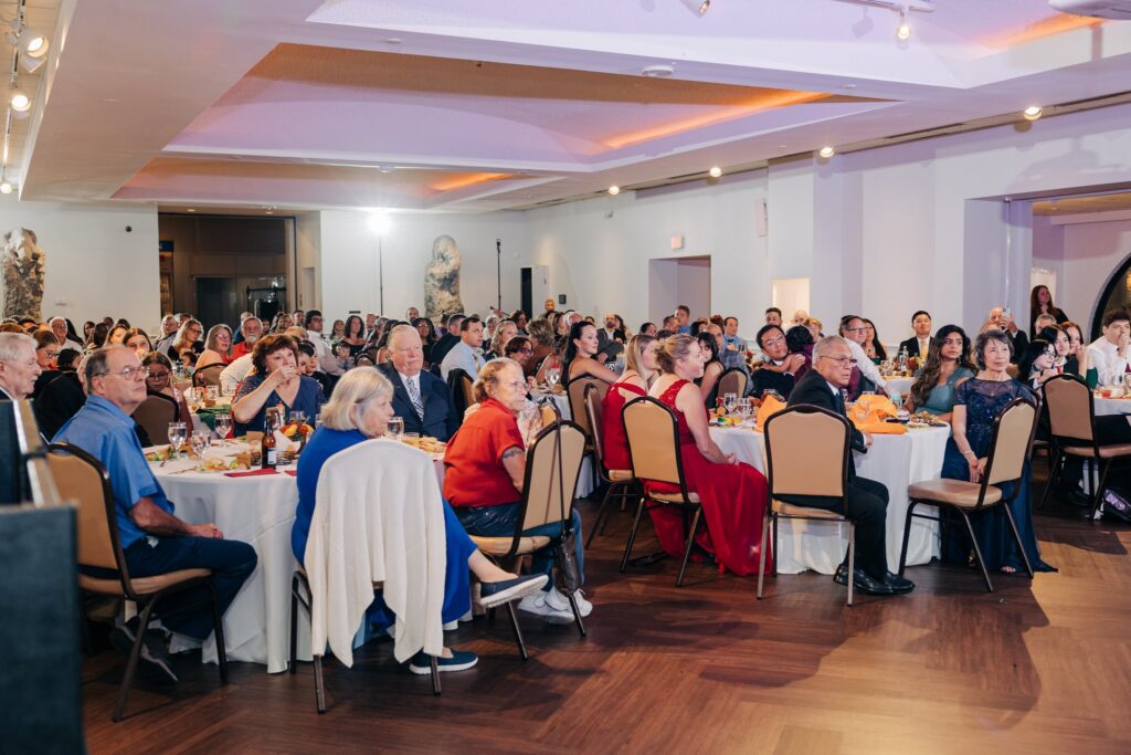 Wedding guests sat at tables.