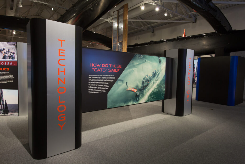 Signages in The Speed and Innovation in The America's Cup gallery, highlighting the technology of the vessels.