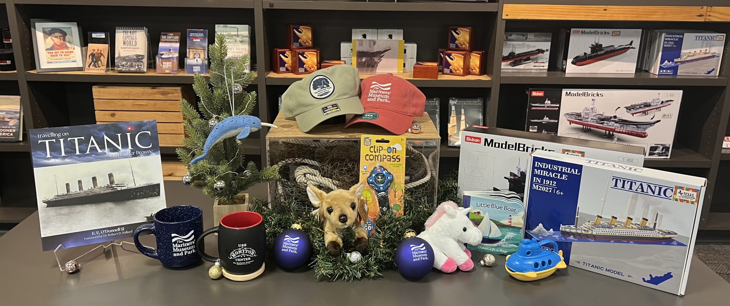Image of various Mariners' Gift Shop items, from books to household items to children's toys.
