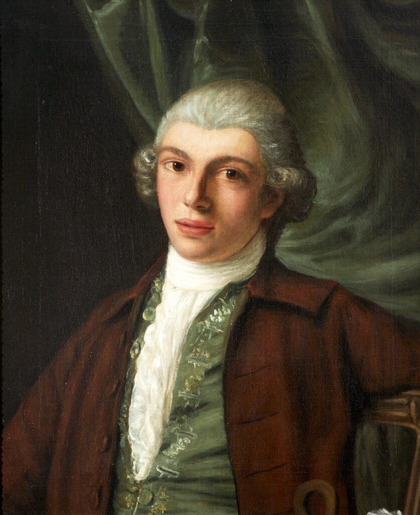 Portrait of a man in formal clothes.